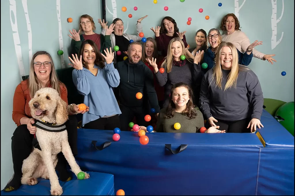 a business team taking a fun and creative photo | zing studio sherwood