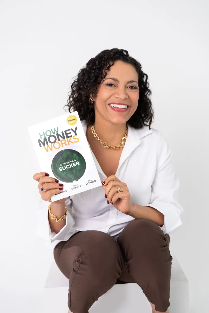 woman-holding-money-book-and-smiling